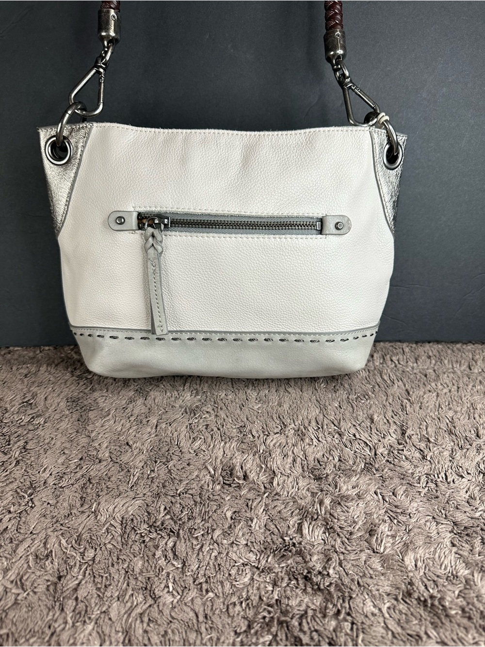 The SAK Cream Leather Shoulder Bag with Silver Accents and Braided Strap